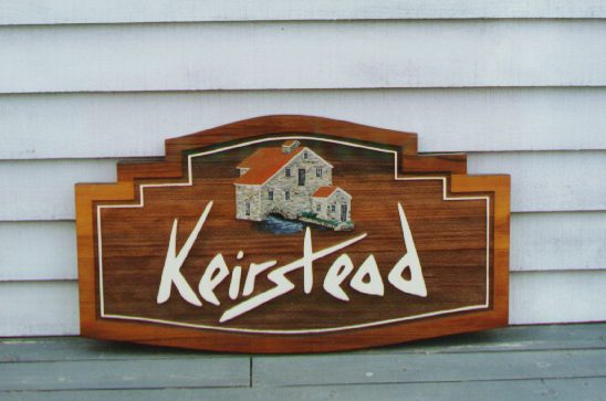 Keirstead sandblasted cedar sign at artist's home on the Cataraqui River